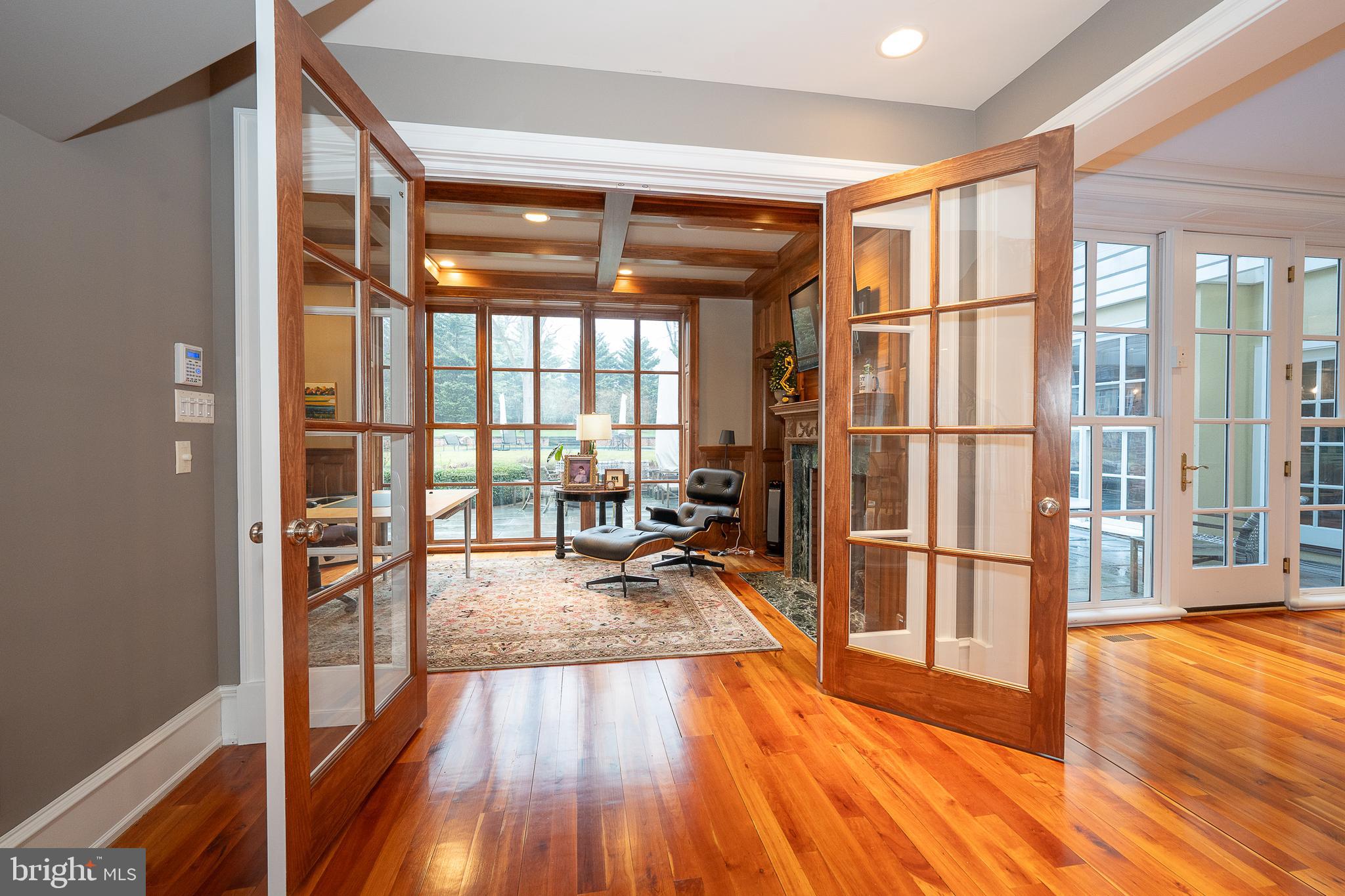 1122 Brynlawn Road Villanova, PA 19085 - Photo 23 of 46 a view of a living room with wooden floor and furniture