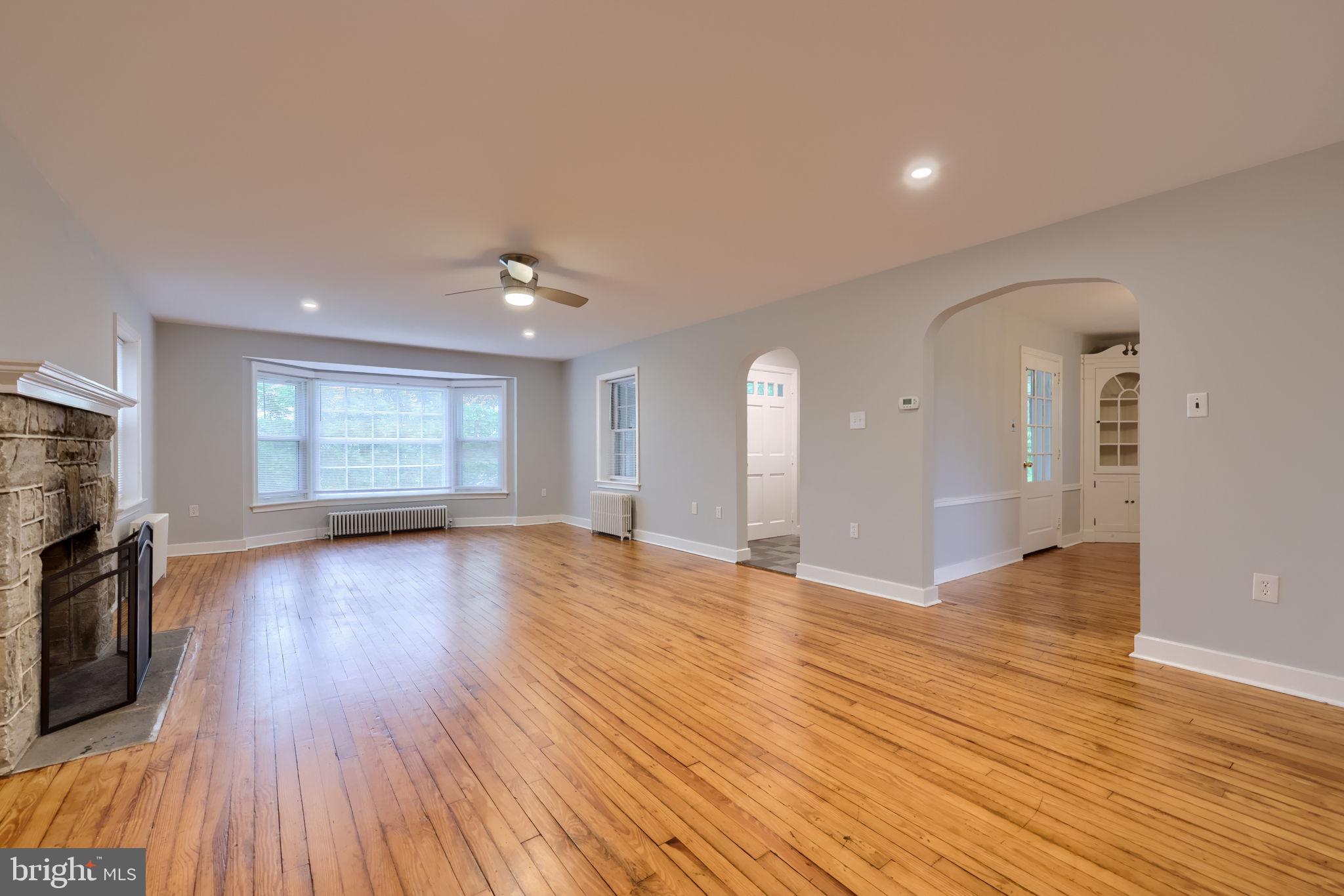 145 Weaver Road Lancaster, PA 17603 - Photo 35 of 87 a view of empty room with wooden floor and fireplace