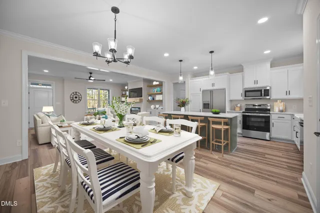 a bathroom with a double vanity sink mirror and