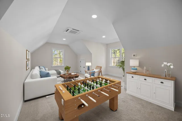 a view of a swimming pool with a yard and mountain view