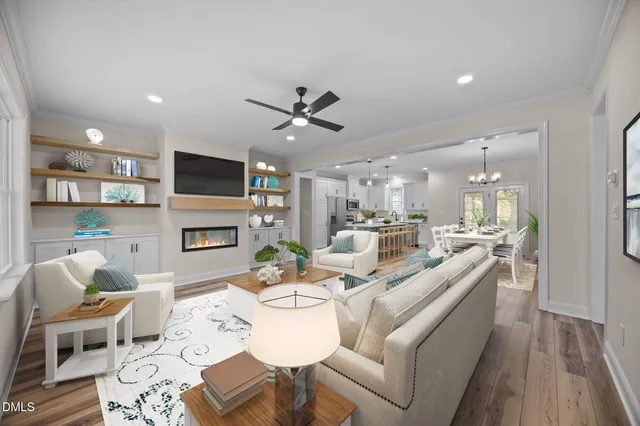 a kitchen with kitchen island a sink stainless steel appliances and cabinets