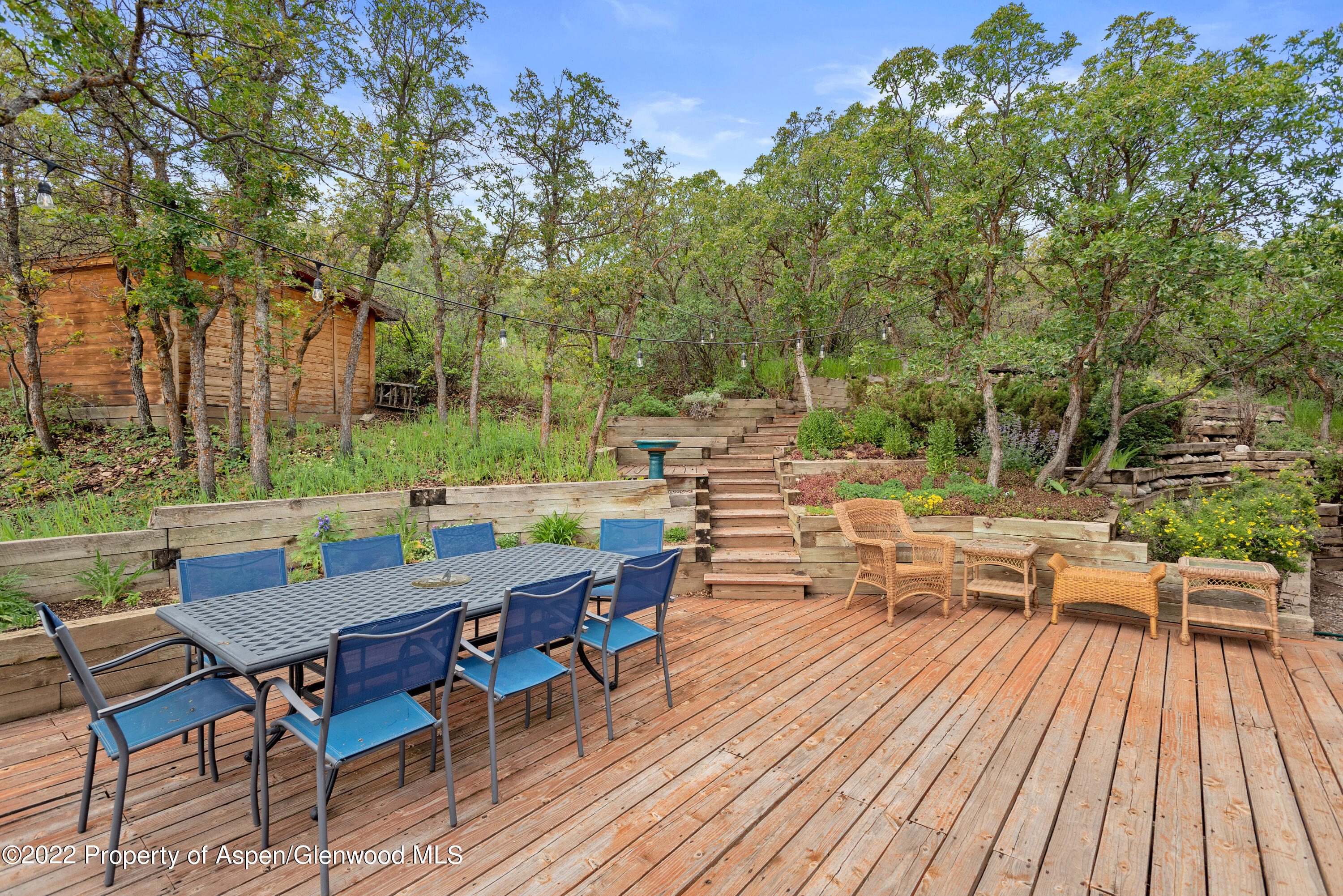540 Upper Ranch Road Aspen, CO 81611 - Photo 15 of 24 an outdoor space with furniture and wooden floor