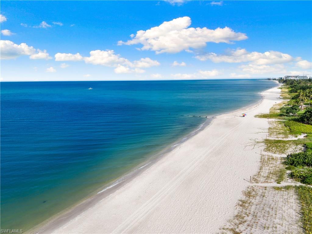 72 7th Street South, Unit 305 Naples, FL 34102 - Photo 22 of 26 a view of an ocean beach