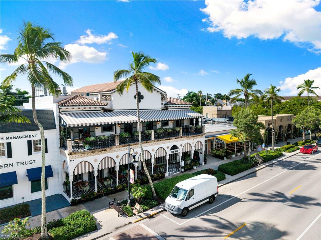 72 7th Street South, Unit 305 Naples, FL 34102 - Photo 23 of 26 a front view of a building with street view