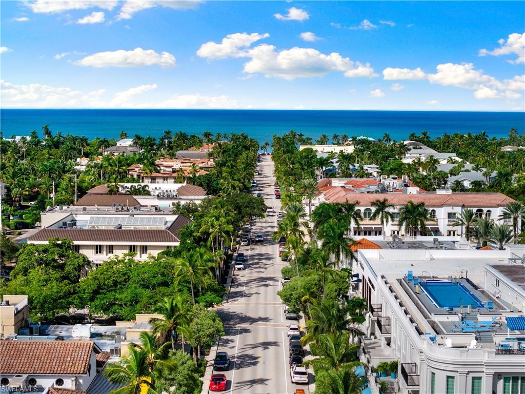 72 7th Street South, Unit 305 Naples, FL 34102 - Photo 25 of 26 an aerial view of multiple houses