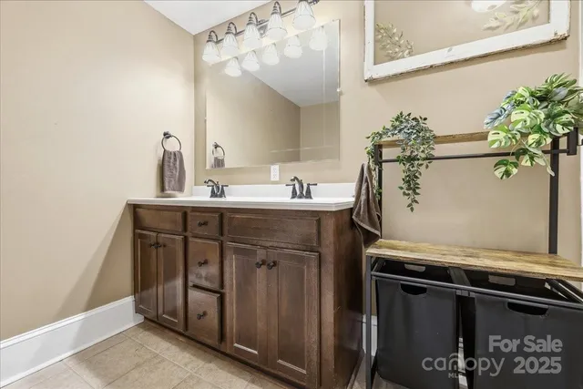 a bathroom with a shower and a sink