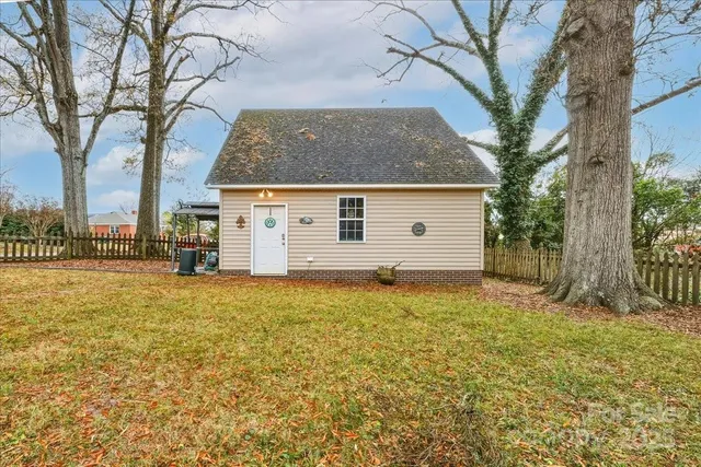 a view of a chairs and table in the patio