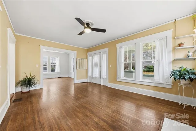 a kitchen with stainless steel appliances granite countertop a stove and a refrigerator