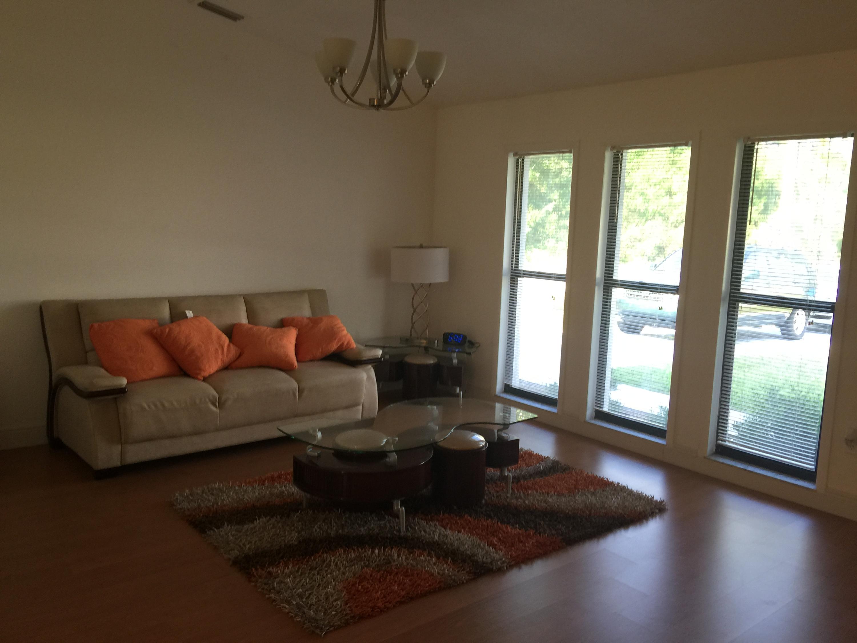 1039 Southwest Fenway Road Port St. Lucie, FL 34953 - Photo 3 of 20 LIVING ROOM