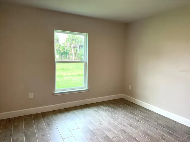 a view of a storage and utility room with sink