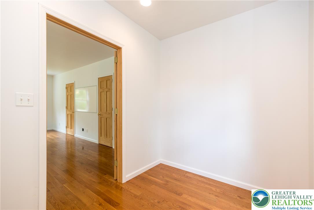 1815 Leithsville Road Hellertown, PA 18055 - Photo 19 of 38 Refined wood flooring extends through this inviting interior space with a wide doorway.