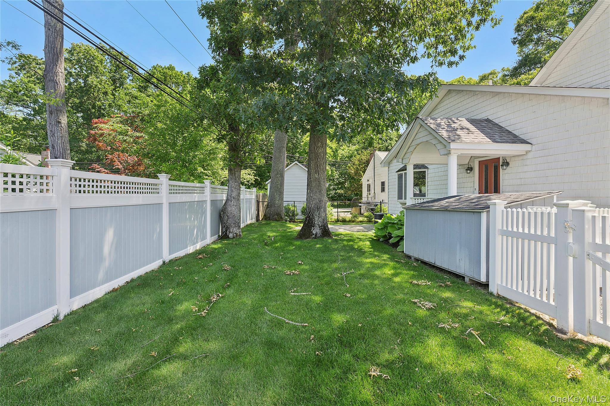 54 Breezy Point Road Wading River, NY 11792 - Photo 16 of 17 Backyard