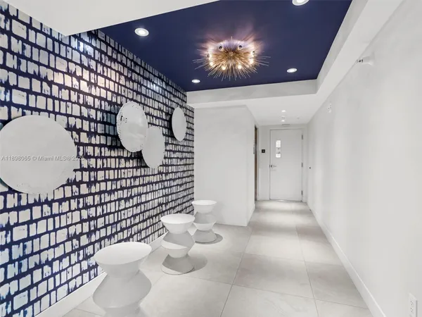 an aerial view of residential building and ocean