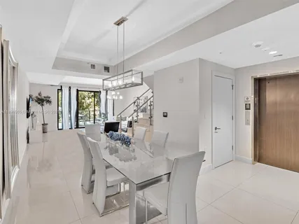 a view of a livingroom with furniture and window