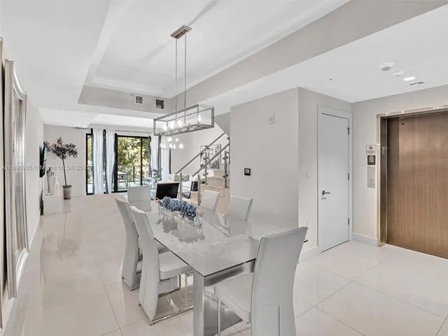 a view of a livingroom with furniture and window
