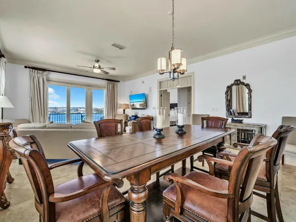 a kitchen with granite countertop a sink a counter space appliances and cabinets