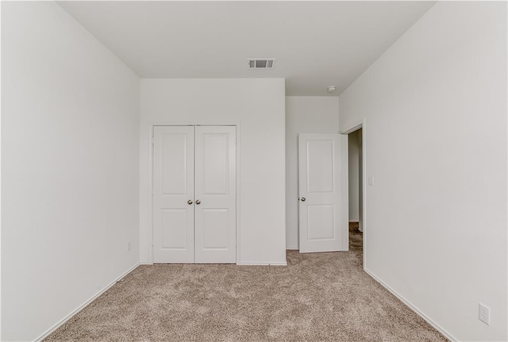 712 Affazia Lane Georgetown, TX 78628 - Photo 15 of 40 a view of an empty room