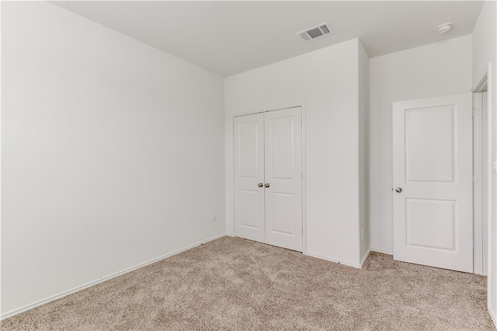 712 Affazia Lane Georgetown, TX 78628 - Photo 16 of 40 a view of an empty room