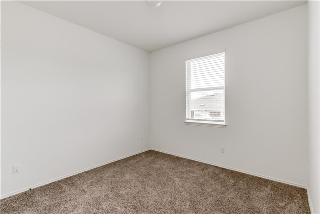 712 Affazia Lane Georgetown, TX 78628 - Photo 17 of 40 an empty room with a window