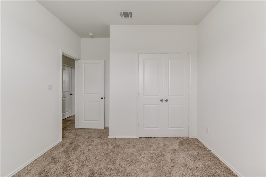 712 Affazia Lane Georgetown, TX 78628 - Photo 19 of 40 a view of an empty room