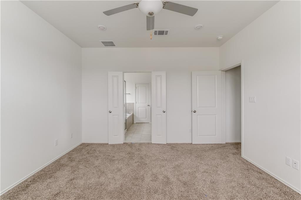 712 Affazia Lane Georgetown, TX 78628 - Photo 22 of 40 wooden floor in an empty room