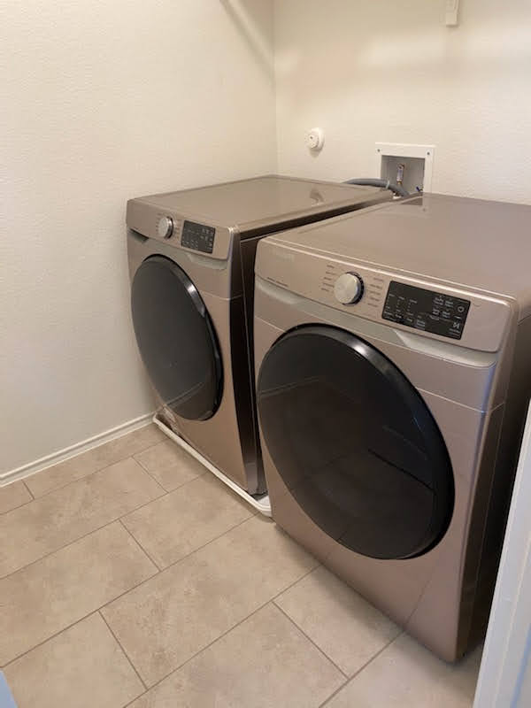 712 Affazia Lane Georgetown, TX 78628 - Photo 31 of 40 a utility room with dryer and washer