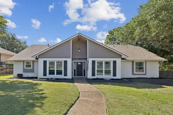 a view of a house with swimming pool and porch