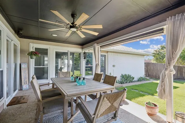 a view of an outdoor space with furniture