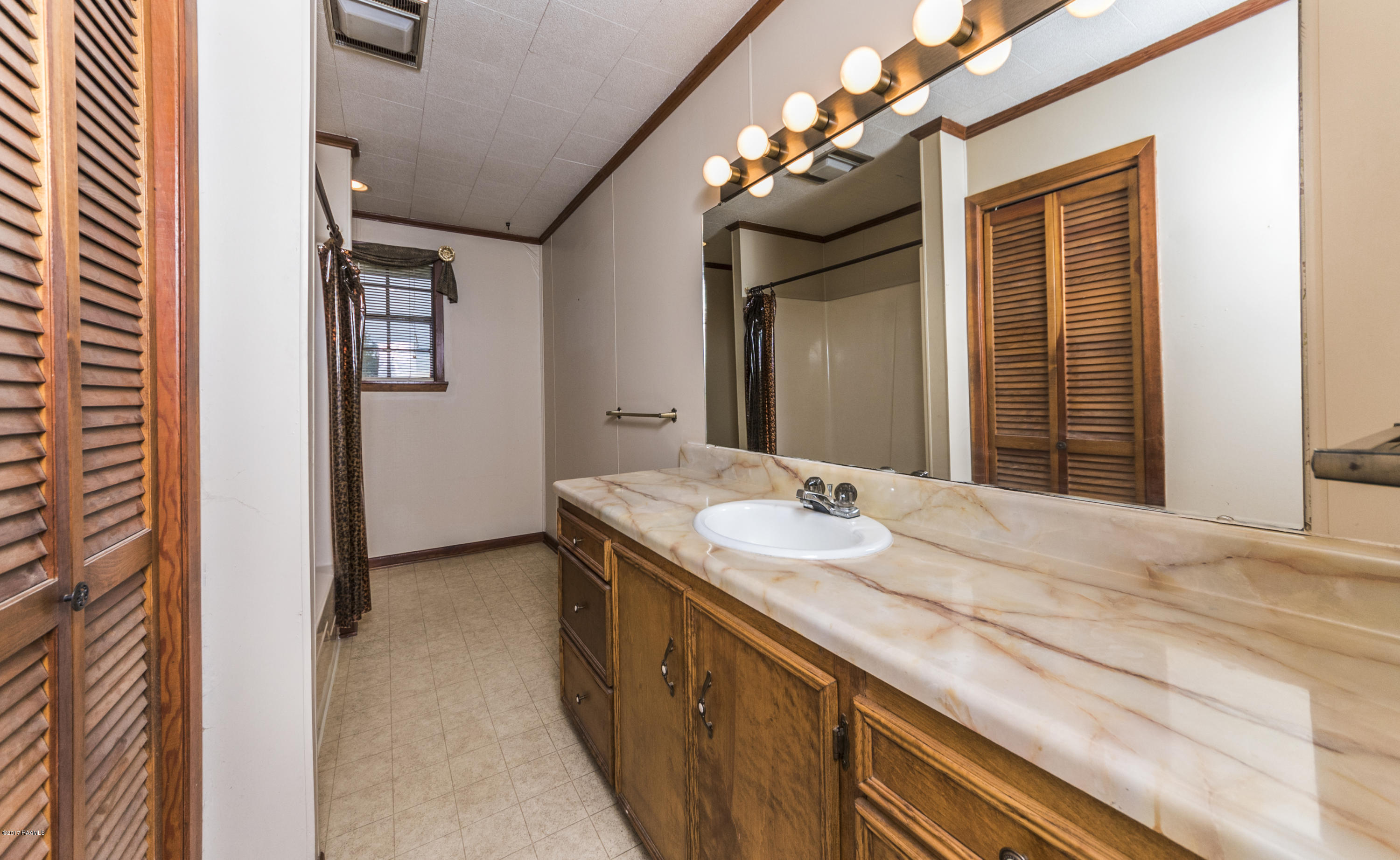 1111 Camp Bon Temps Road Breaux Bridge, LA 70517 - Photo 25 of 33 Guest Bath 1