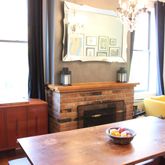 a dining room with a table and chairs