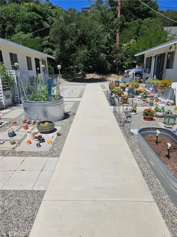 a view of roof deck with furniture