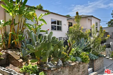 a view front of house with potted plant