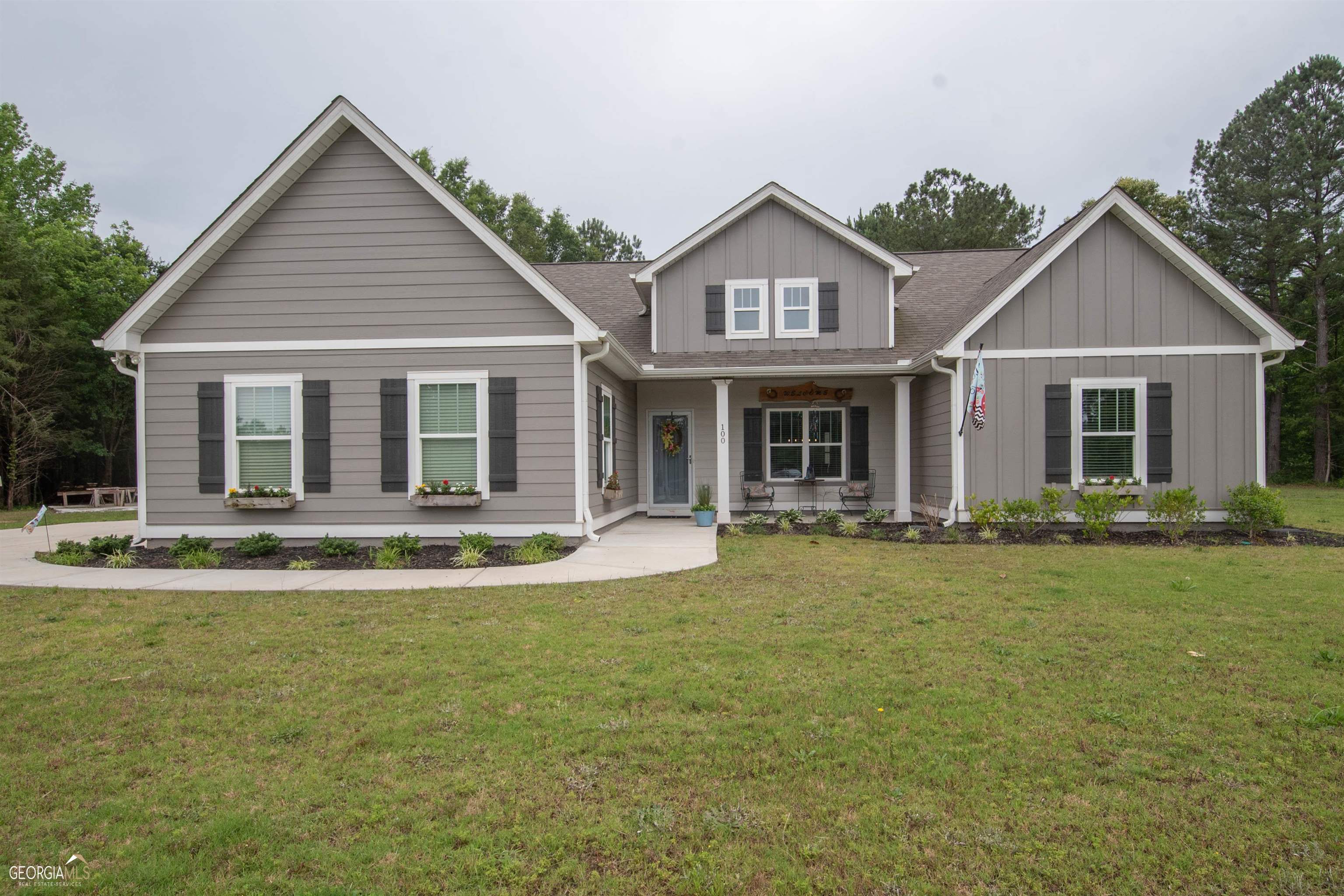 100 Courtland Road Brooks, GA 30205 - Photo 1 of 1 front view of a house with a yard