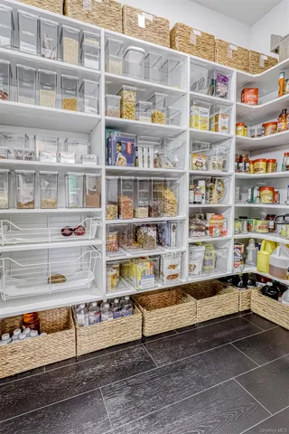 a view of a room with shelves
