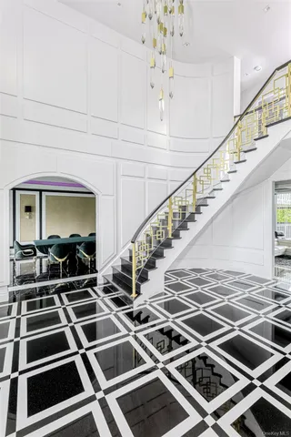 a view of a patio with table and chairs