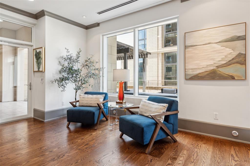 2300 Wolf Street, Unit 3D Dallas, TX 75201 - Photo 11 of 37 a living room with furniture and a large window