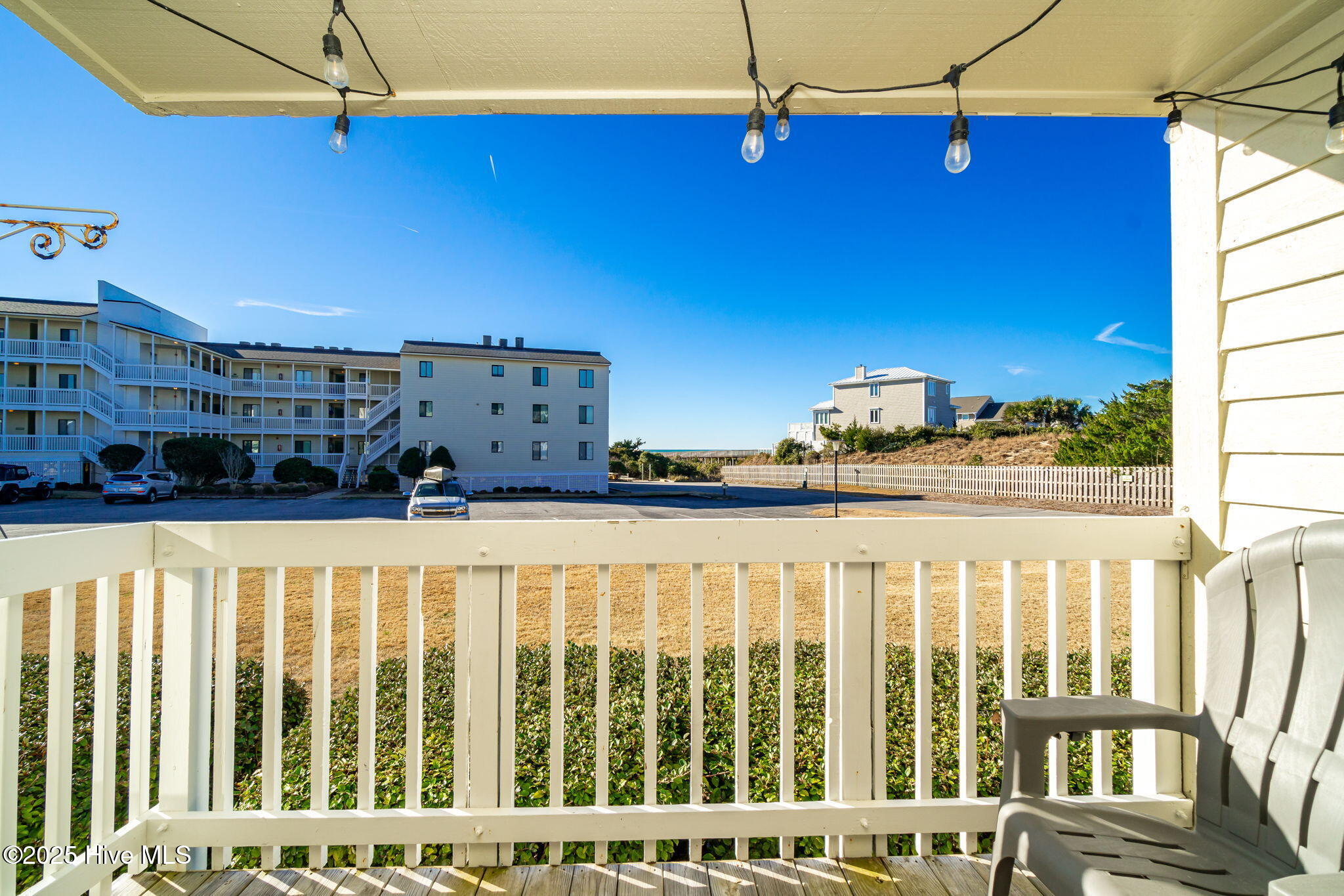 10300 Coast Guard Road, Unit C103 POINT EMERALD VILLAS Emerald Isle, NC 28594 - Photo 13 of 44 View from covered porch