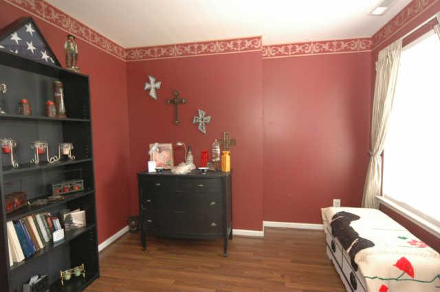 1428 Weston Lane Spring Hill, TN 37174 - Photo 15 of 19 a bedroom with a bed and a window