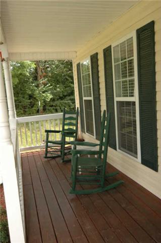 1428 Weston Lane Spring Hill, TN 37174 - Photo 2 of 19 a view of a two chairs in the balcony