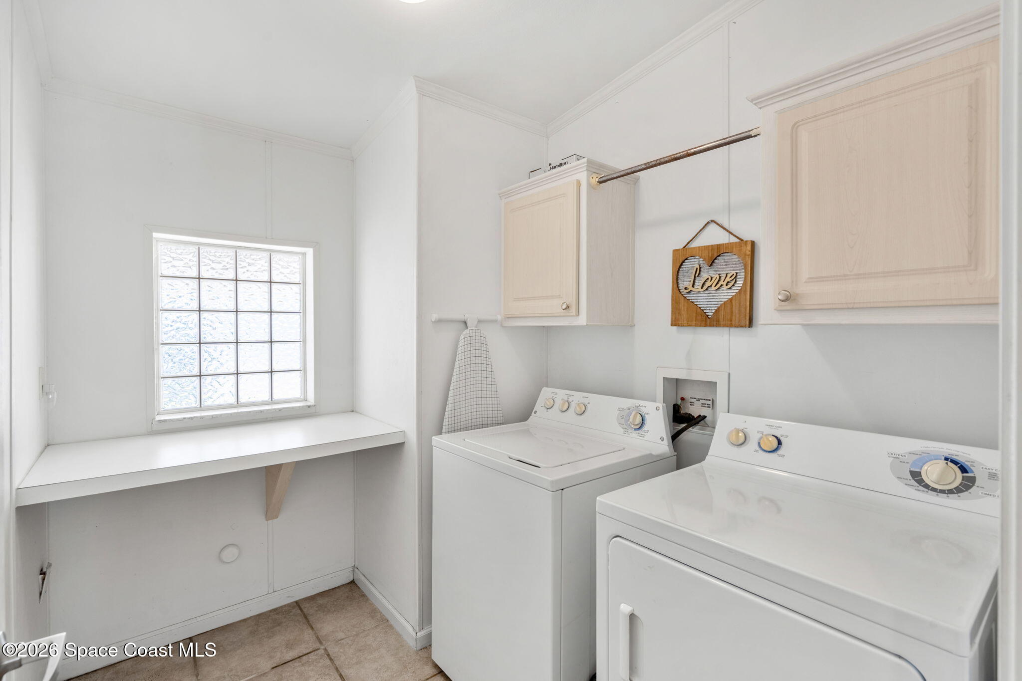 7505 Agawam Road Micco, FL 32976 - Photo 33 of 47 a utility room with dryer and washer