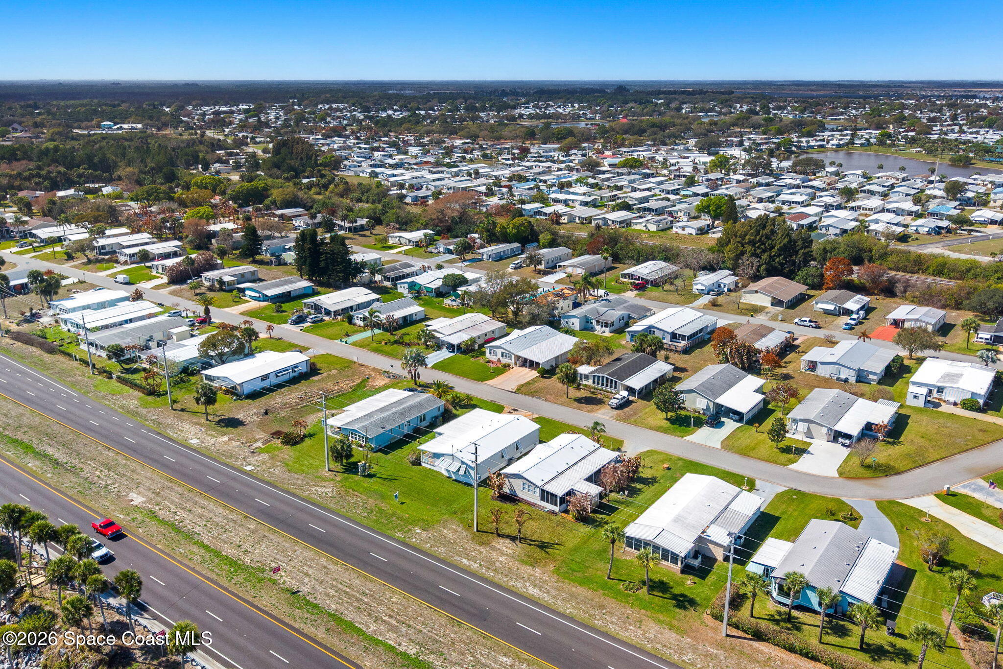 7505 Agawam Road Micco, FL 32976 - Photo 41 of 47 an aerial view of a city