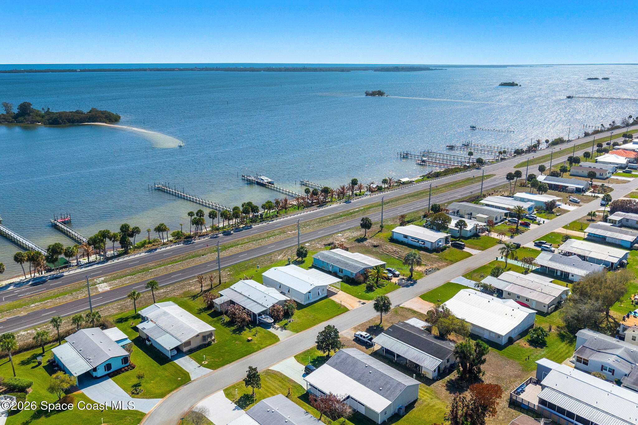 7505 Agawam Road Micco, FL 32976 - Photo 46 of 47 an aerial view of a city