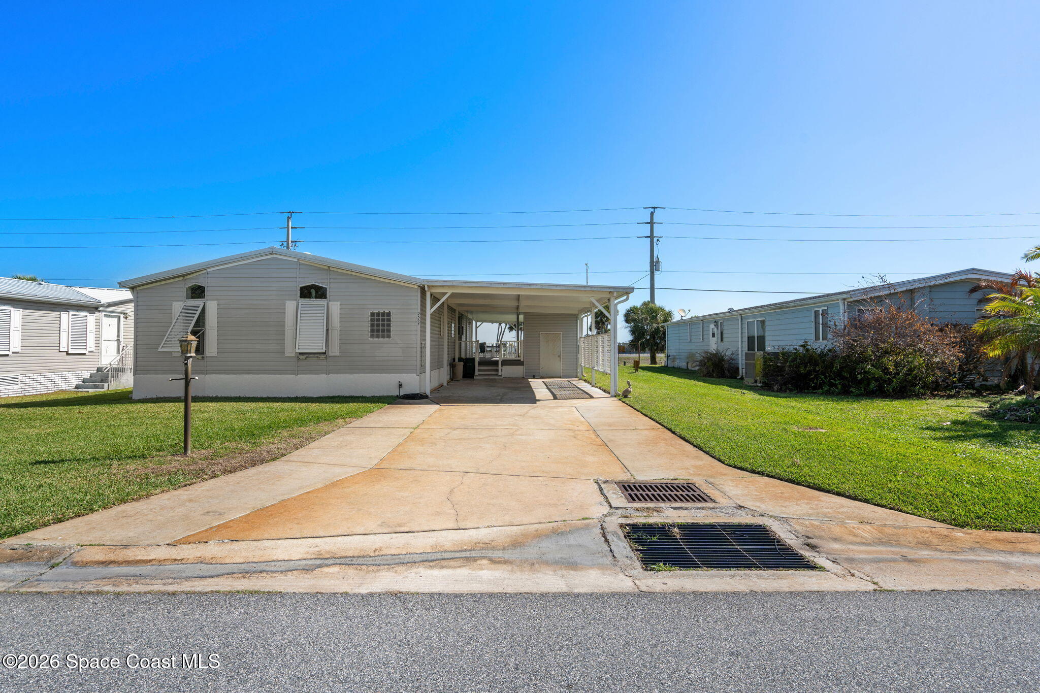 7505 Agawam Road Micco, FL 32976 - Photo 6 of 47 Driveway Back of House