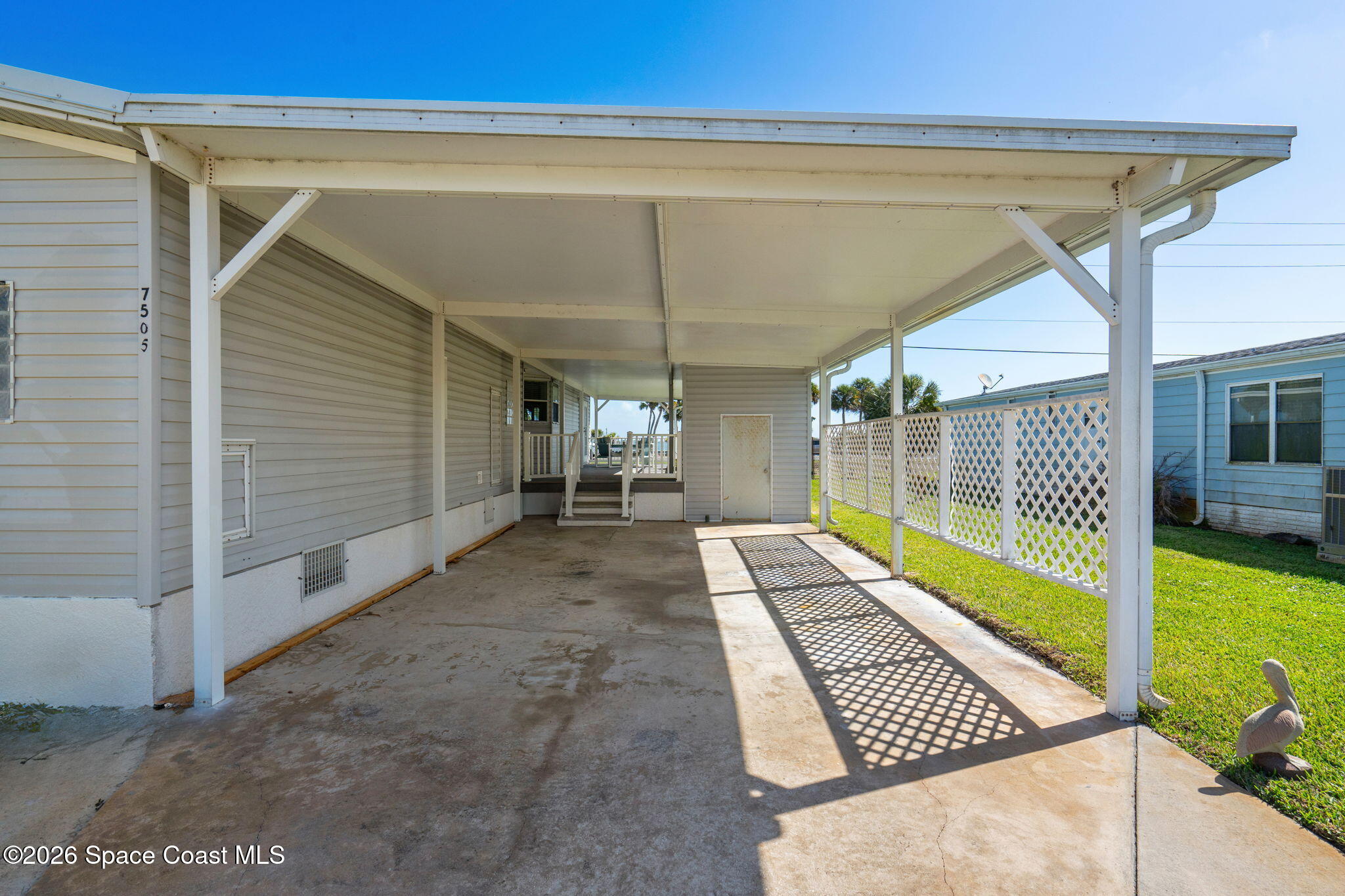 7505 Agawam Road Micco, FL 32976 - Photo 10 of 47 Car Port