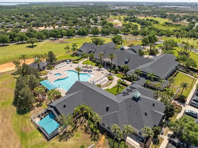 a view of a yard with swimming pool