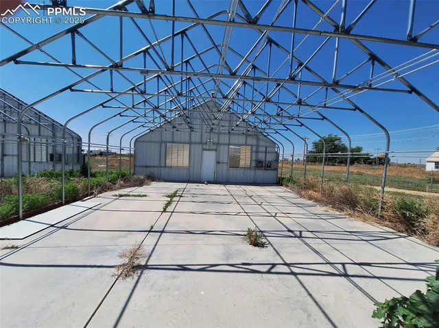 a view of a backyard of the house
