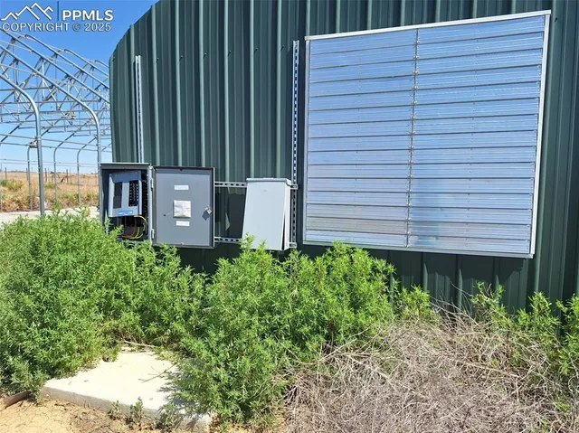 a view of a backyard of the house