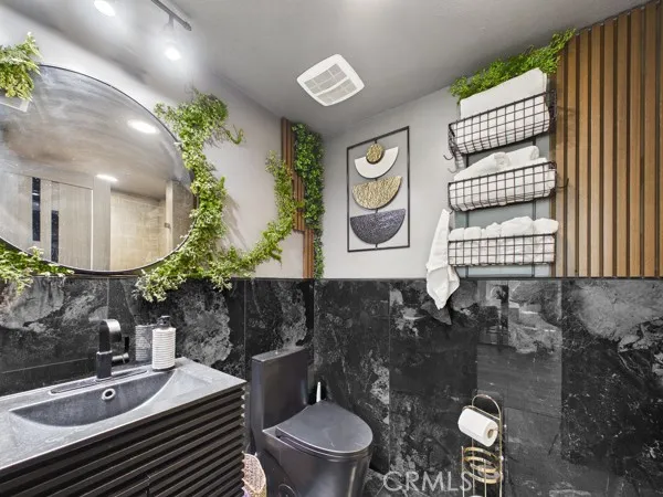 a bedroom with double bed and a window