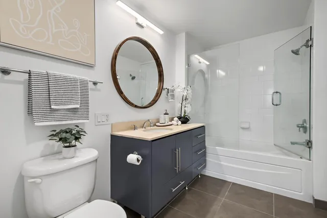 a swimming pool with outdoor seating and yard