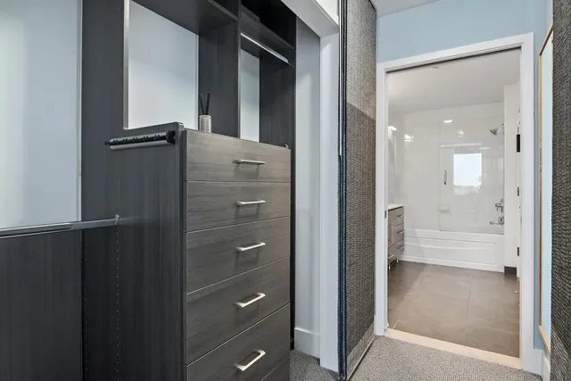 a view of staircase with a rug